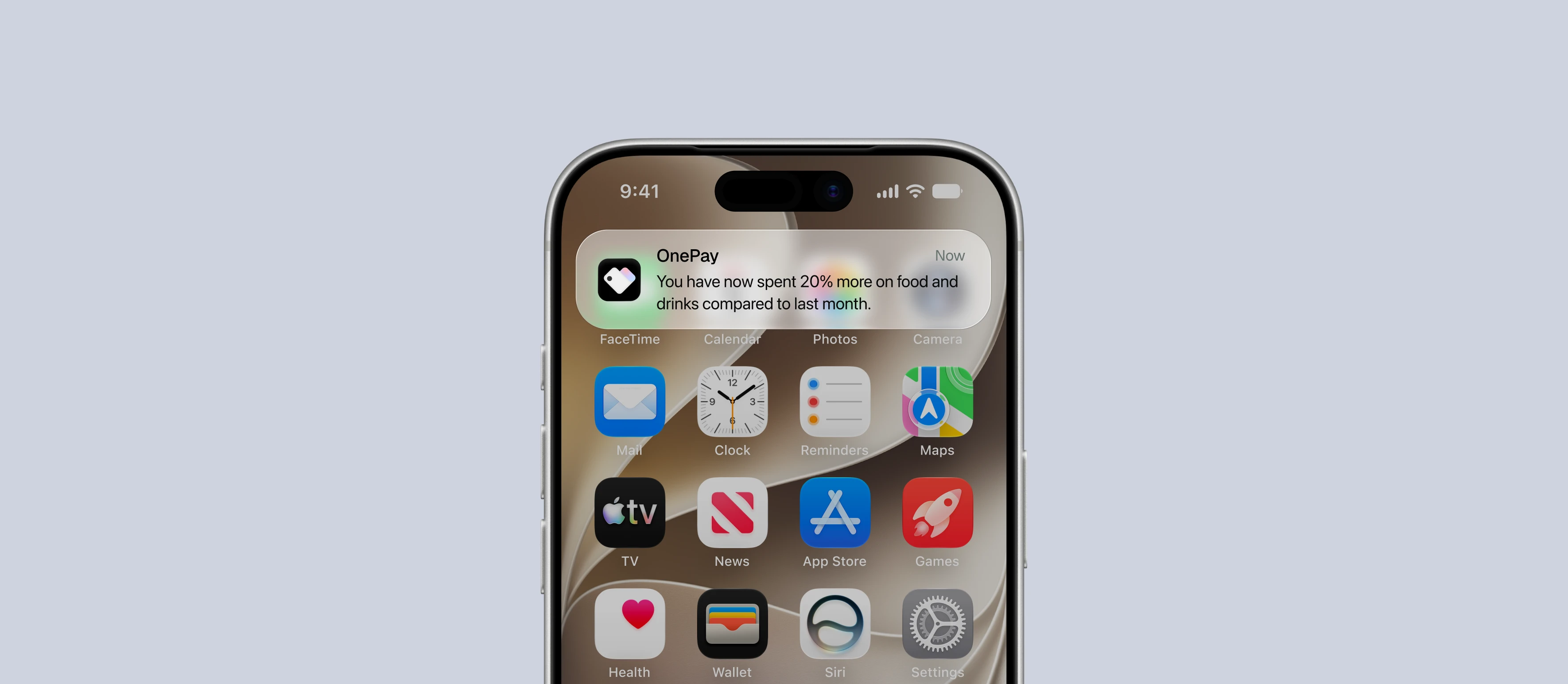 An iPhone lock screen with a OnePay notification: you have now spent 20% more on food and drinks compared to last month